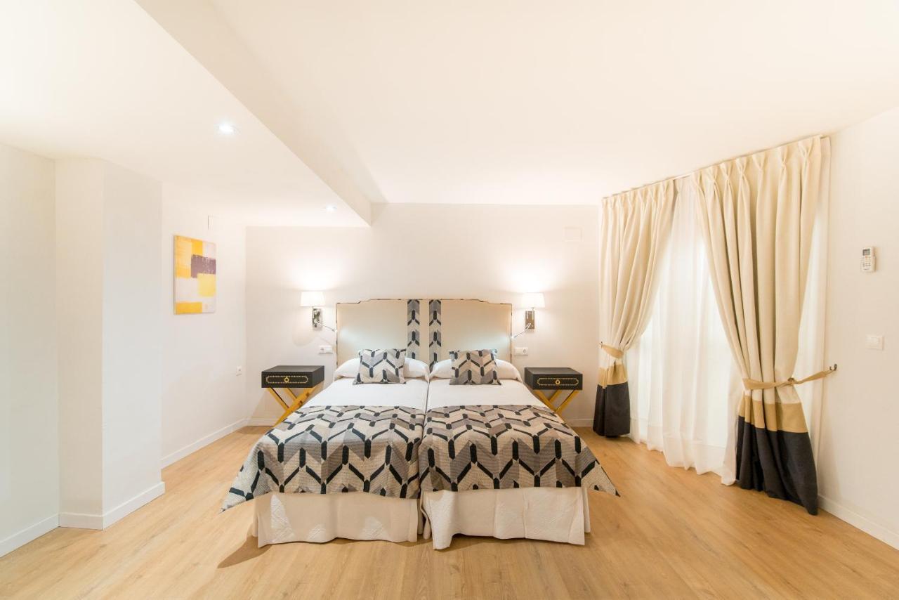 Arco Macarena Lofts Aparthotel Sevilla Bagian luar foto