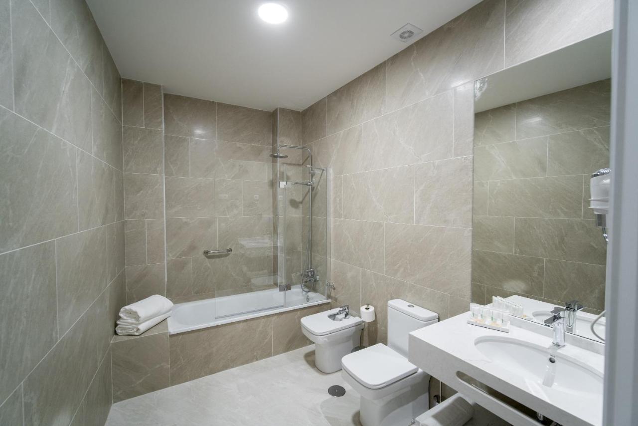 Arco Macarena Lofts Aparthotel Sevilla Bagian luar foto