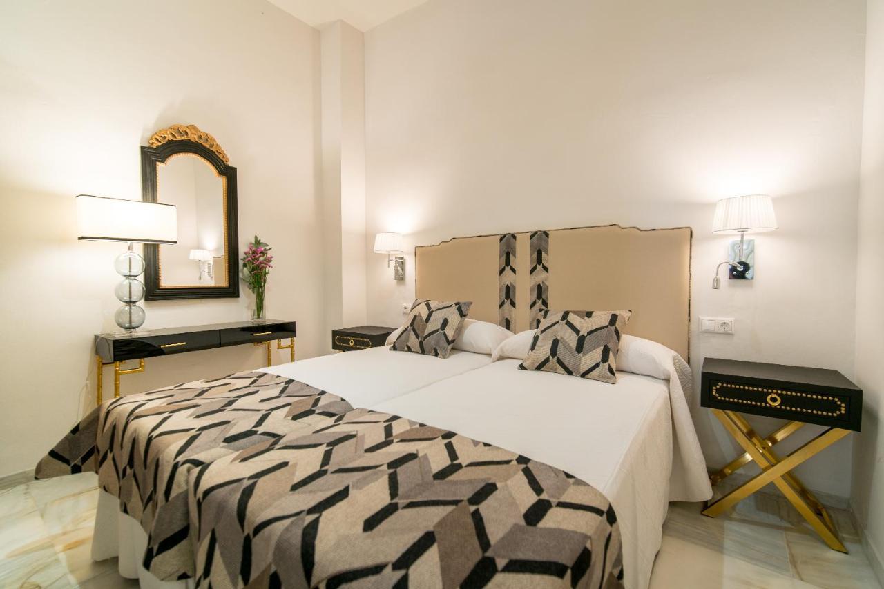 Arco Macarena Lofts Aparthotel Sevilla Bagian luar foto