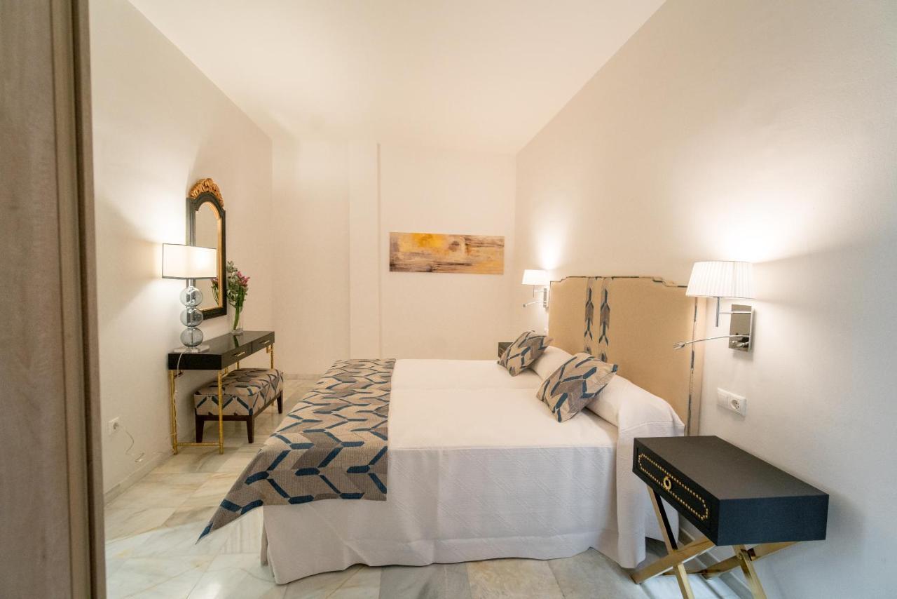 Arco Macarena Lofts Aparthotel Sevilla Bagian luar foto