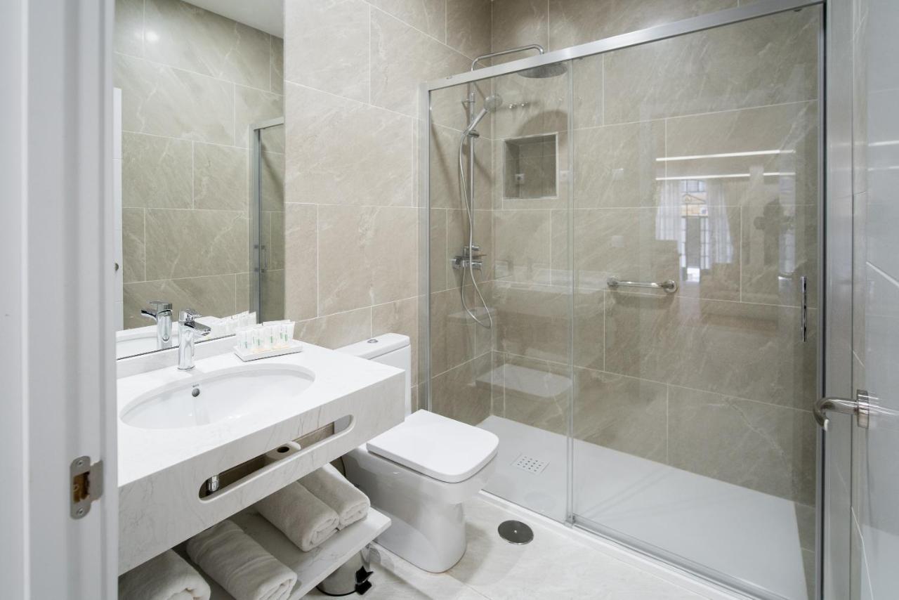 Arco Macarena Lofts Aparthotel Sevilla Bagian luar foto
