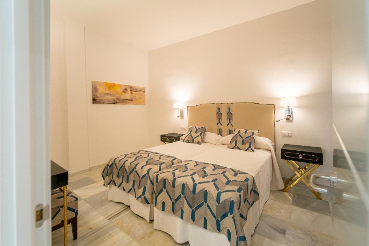 Arco Macarena Lofts Aparthotel Sevilla Bagian luar foto