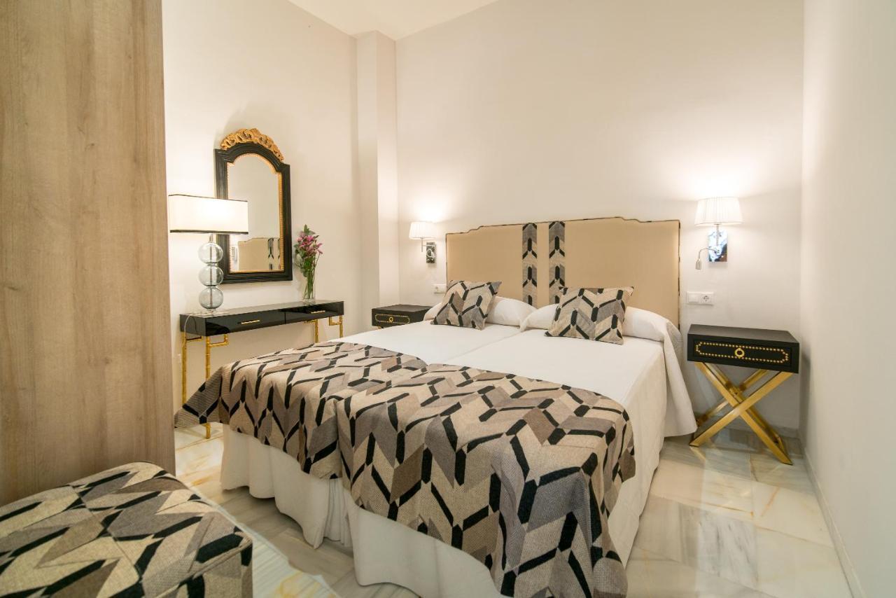 Arco Macarena Lofts Aparthotel Sevilla Bagian luar foto